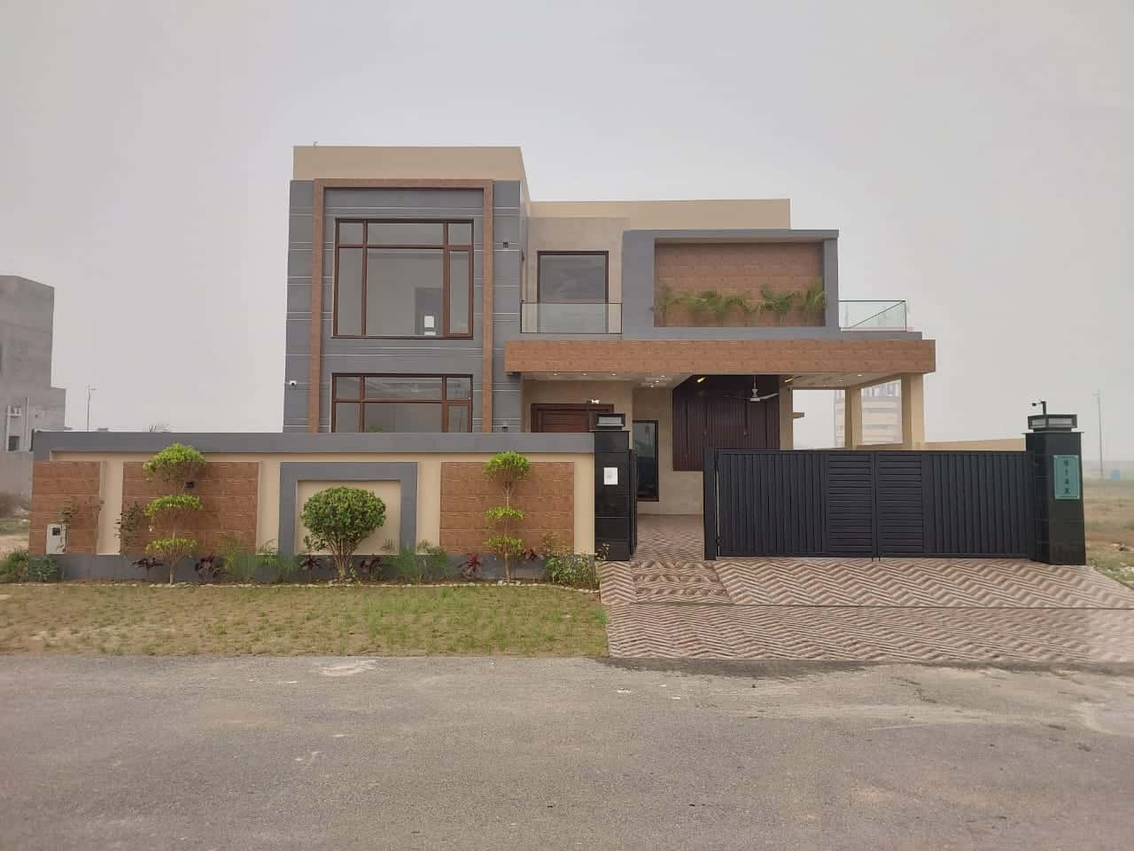 Brand New 1 Kanal Semi-Furnished House for Sale in DHA Phase 7– 5 Beds, 2 Kitchens, Lawn, CCTV