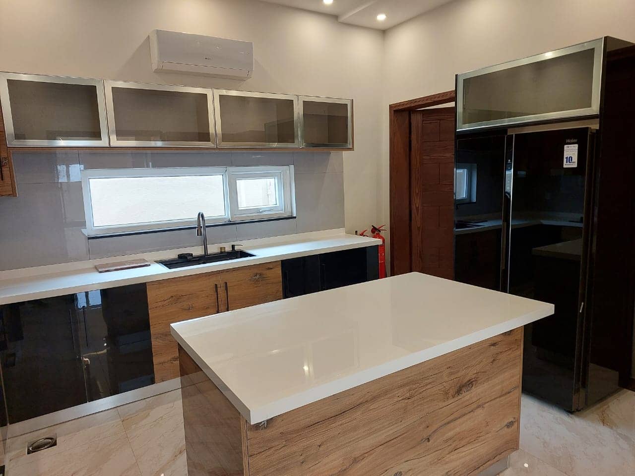 Brand New 1 Kanal Semi-Furnished House for Sale in DHA Phase 7– 5 Beds, 2 Kitchens, Lawn, CCTV 15