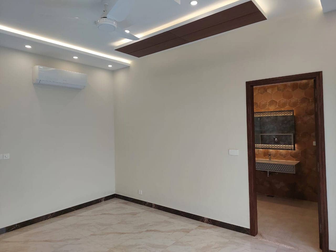 Brand New 1 Kanal Semi-Furnished House for Sale in DHA Phase 7– 5 Beds, 2 Kitchens, Lawn, CCTV 27