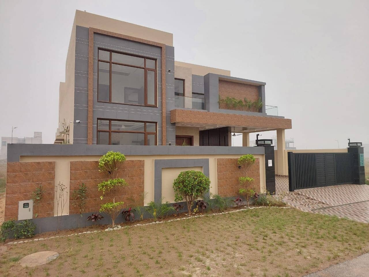 Brand New 1 Kanal Semi-Furnished House for Sale in DHA Phase 7– 5 Beds, 2 Kitchens, Lawn, CCTV 2
