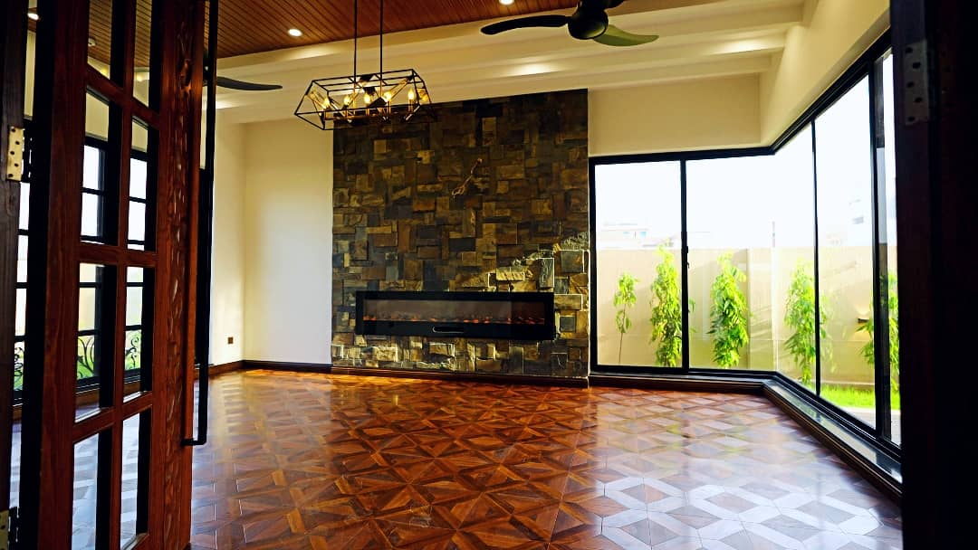 1 Kanal Designer House in DHA Phase 7 | Stone Exterior, Full Basement & Double Lawns 9