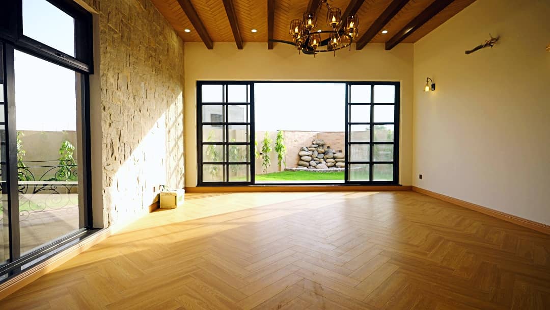 1 Kanal Designer House in DHA Phase 7 | Stone Exterior, Full Basement & Double Lawns 13