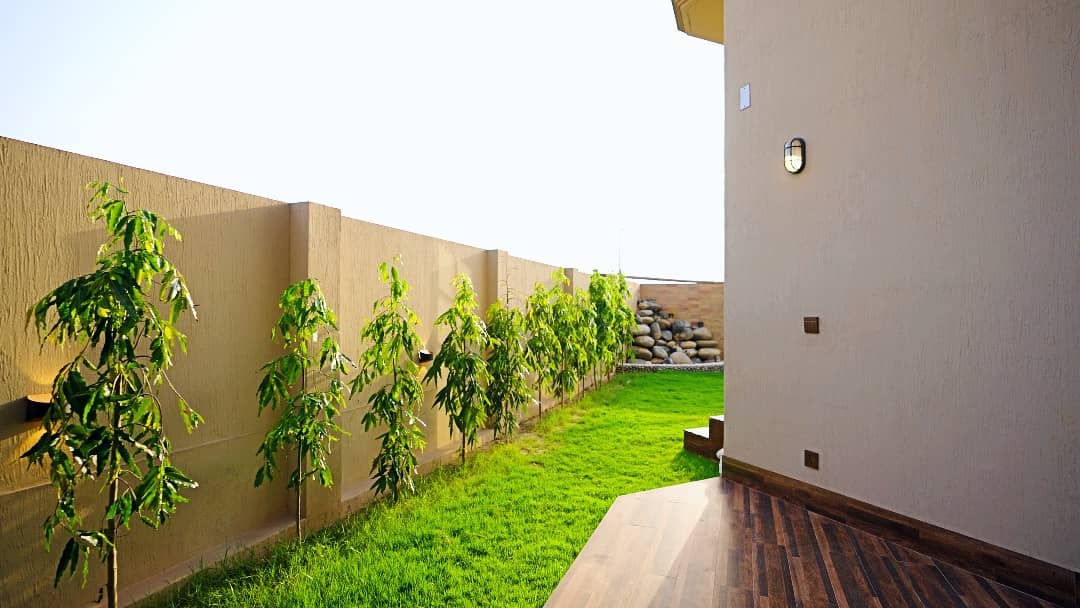 1 Kanal Designer House in DHA Phase 7 | Stone Exterior, Full Basement & Double Lawns 15