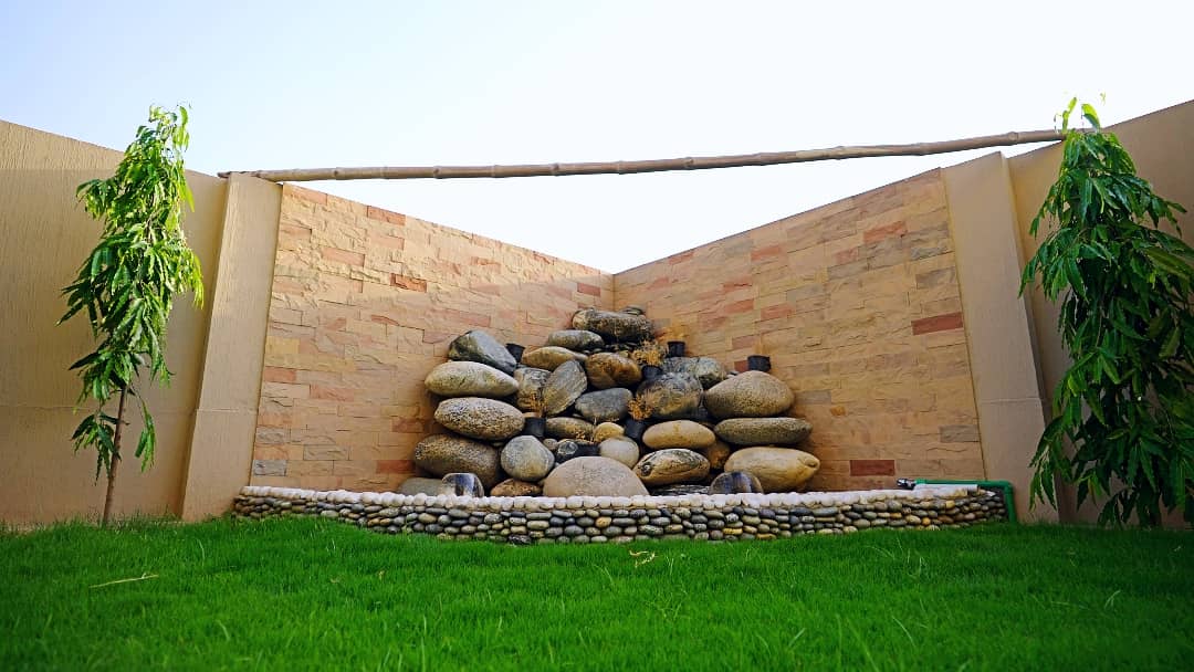 1 Kanal Designer House in DHA Phase 7 | Stone Exterior, Full Basement & Double Lawns 17