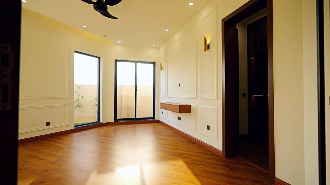 1 Kanal Designer House in DHA Phase 7 | Stone Exterior, Full Basement & Double Lawns 21