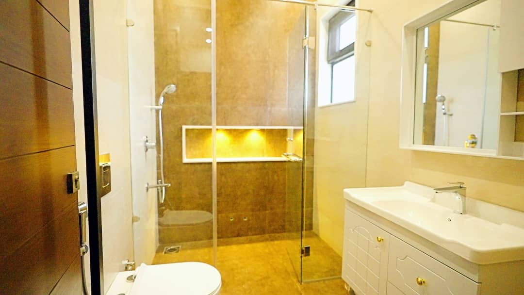 1 Kanal Designer House in DHA Phase 7 | Stone Exterior, Full Basement & Double Lawns 23