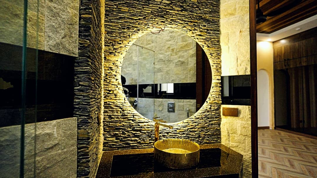 1 Kanal Designer House in DHA Phase 7 | Stone Exterior, Full Basement & Double Lawns 27