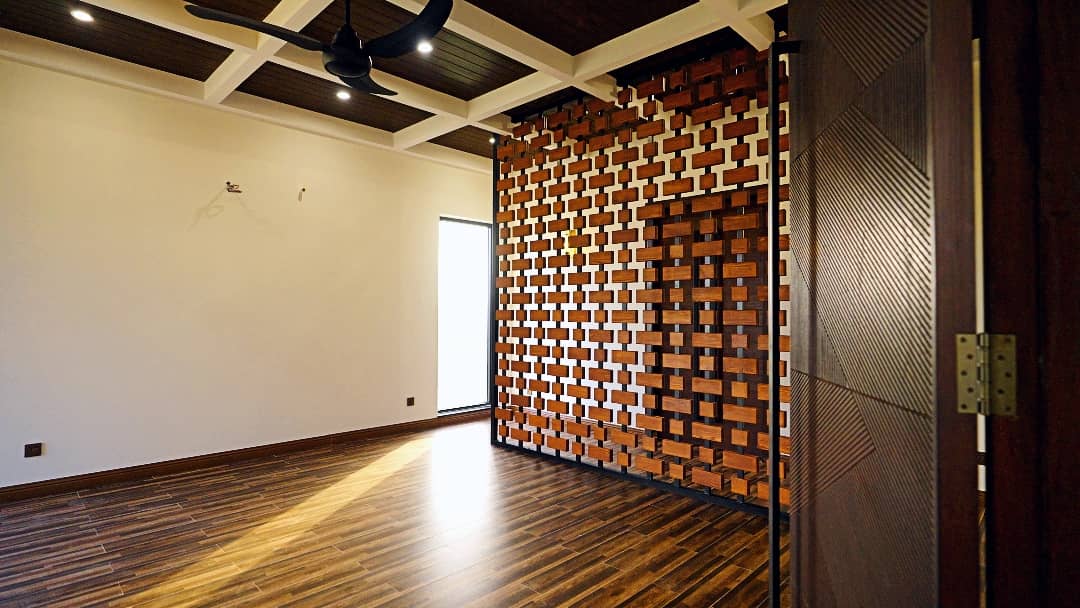 1 Kanal Designer House in DHA Phase 7 | Stone Exterior, Full Basement & Double Lawns 31