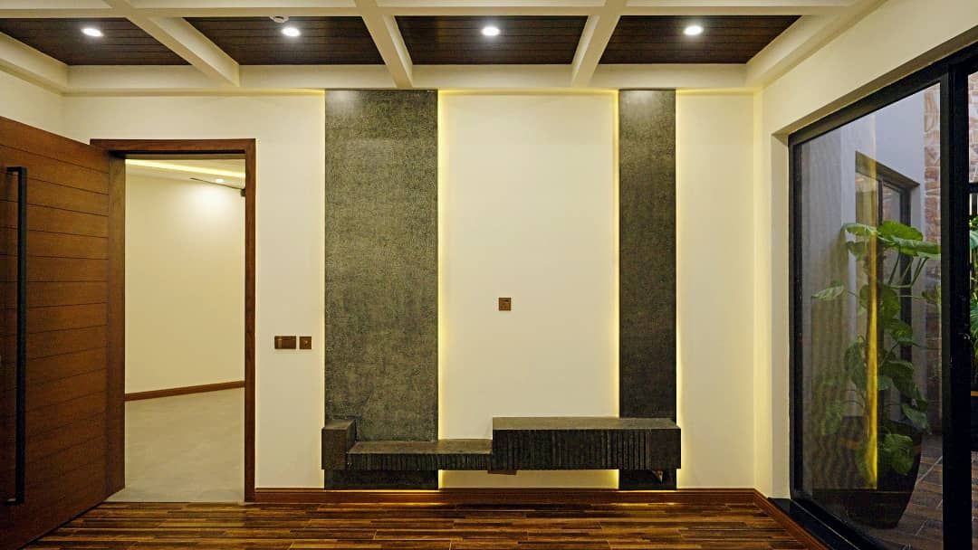 1 Kanal Designer House in DHA Phase 7 | Stone Exterior, Full Basement & Double Lawns 41