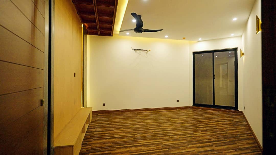 1 Kanal Designer House in DHA Phase 7 | Stone Exterior, Full Basement & Double Lawns 44