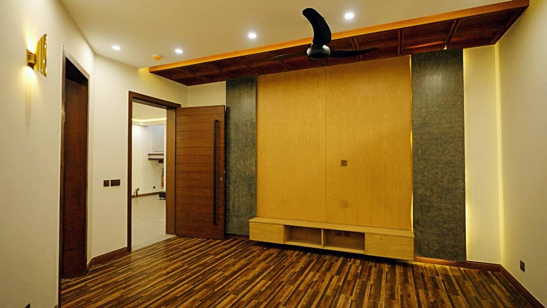 1 Kanal Designer House in DHA Phase 7 | Stone Exterior, Full Basement & Double Lawns 45