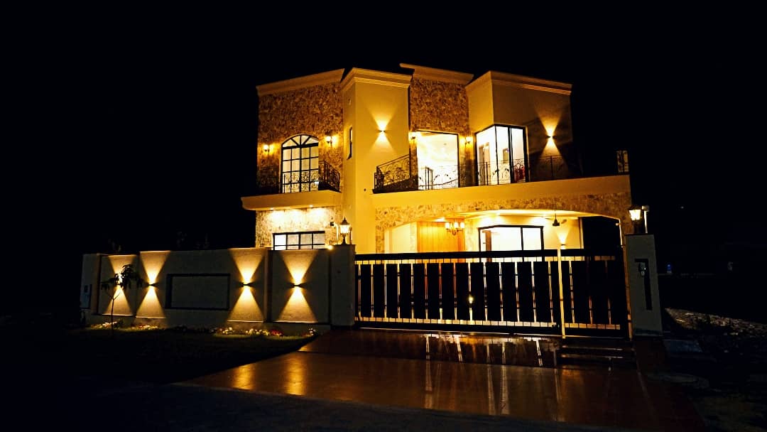 1 Kanal Designer House in DHA Phase 7 | Stone Exterior, Full Basement & Double Lawns 47